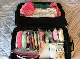 Here's a step by step guide on how to pack baby clothes for travel.